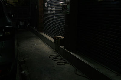 Empty alley amidst buildings in city