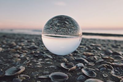 Close-up of crystal ball on table