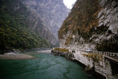 Scenic view of river amidst trees