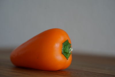 Close-up of orange fruit on table