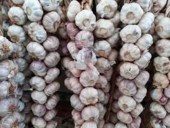 Full frame shot of onions for sale in market