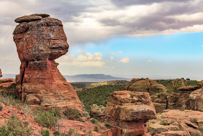 Rock formations on landscape against cloudy sky in aragon. 