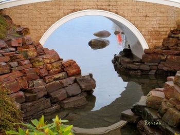 High angle view of reflection of building in lake