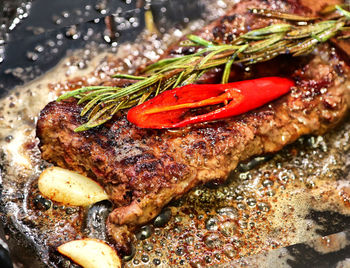 Close-up of food on barbecue grill