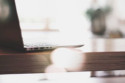 Close-up of laptop on table