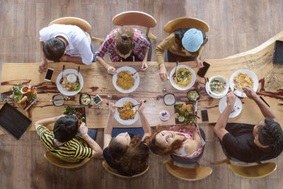 High angle view of people eating food