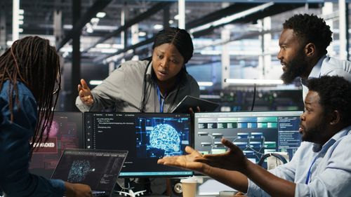 Businesswoman using laptop at office