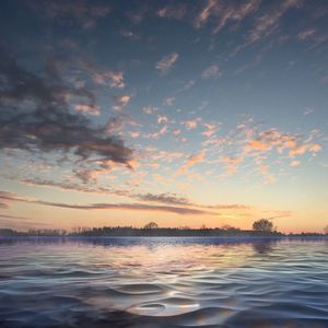 Scenic view of sea at sunset