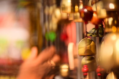 Close-up of illuminated light bulbs in market