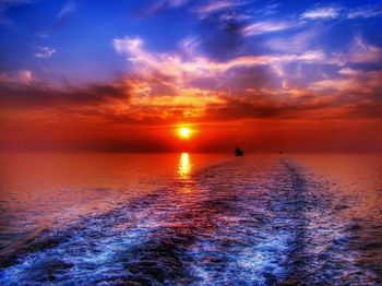 Scenic view of sea against sky during sunset