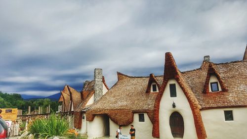 Low angle view of houses against sky