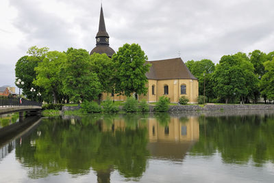 Reflection of built structures in lake