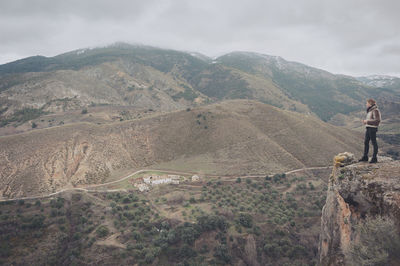 Man standing on mountain landscape