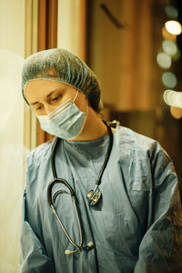 Exhausted doctor wearing mask