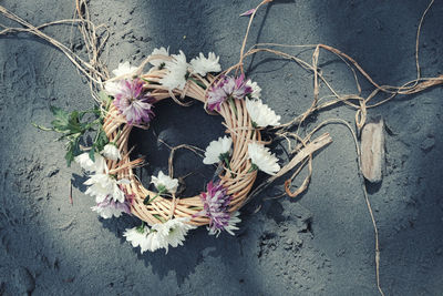 Directly above shot of wreath at beach