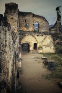 Abandoned historic building against sky