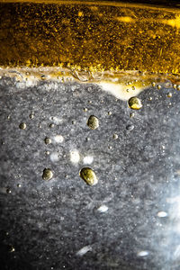 Close-up of water drops on glass