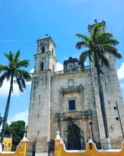 Low angle view of church against clear blue sky