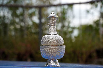 Close-up of water fountain on table