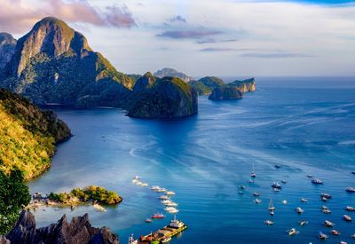 Panoramic view of sea against blue sky