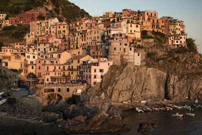 Houses on rock formation at manarola