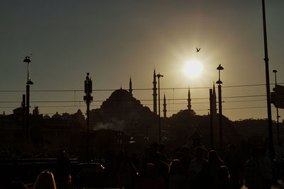 View of built structures at sunset