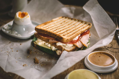 Close up of toasted sandwich on table