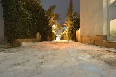 Street amidst buildings against sky