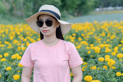 Low section of person standing on field