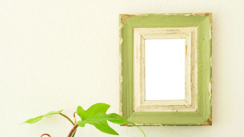 Close-up of window on white wall