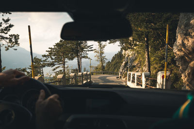 Road seen through car windshield