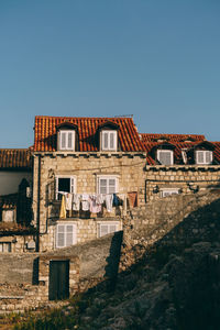 Old building against clear blue sky