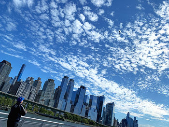 Low angle view of modern buildings against sky