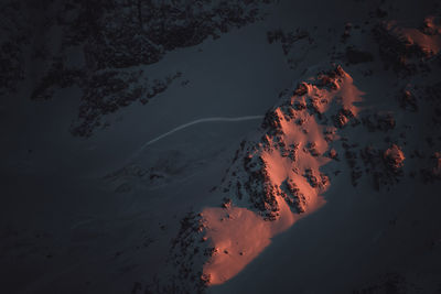 High angle view of land against sky during sunset