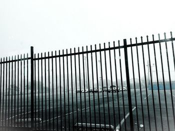 Fence against clear sky