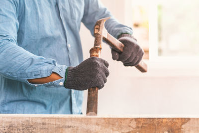 Man working on wood