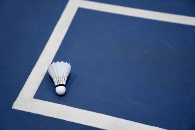 High angle view of table against blue background