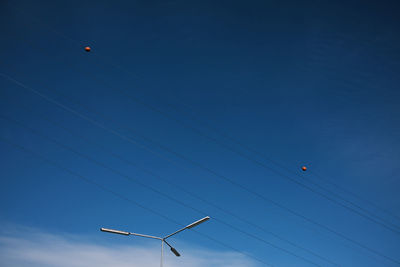 Low angle view of airshow against sky