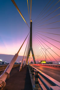 Suspension bridge against blue sky