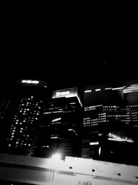 View of illuminated buildings at night