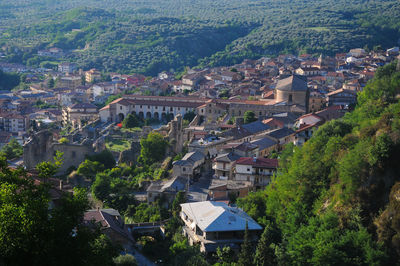 High angle view of townscape and trees in city