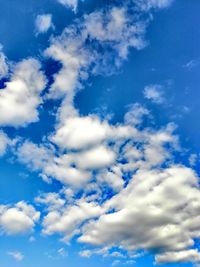 Low angle view of clouds in blue sky