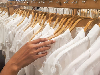 Midsection of woman in bathtub at store