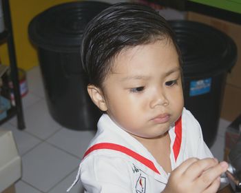 Close-up of cute baby boy at school