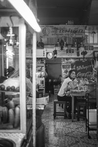 Boy sitting in restaurant