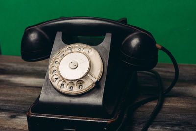 High angle view of telephone on table