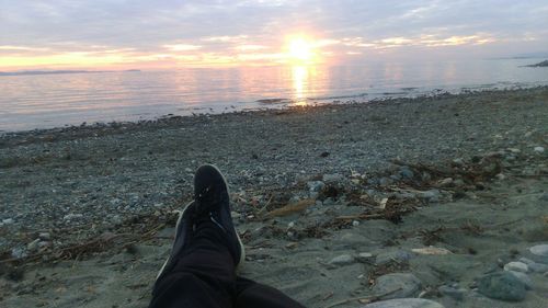 Low section of woman on beach