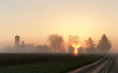 Scenic view of landscape during foggy weather