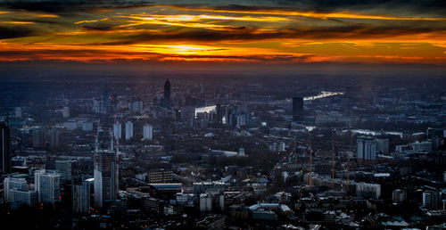 Aerial view of city at sunset