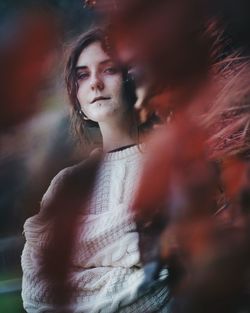 Portrait of woman standing outdoors